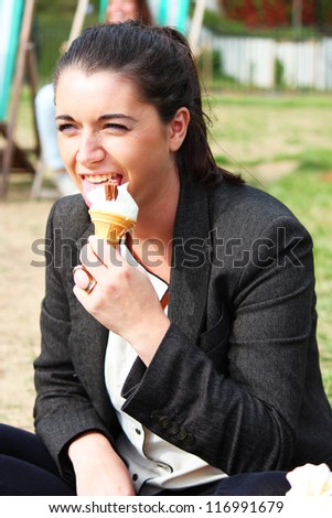 English woman eating an ice cream.