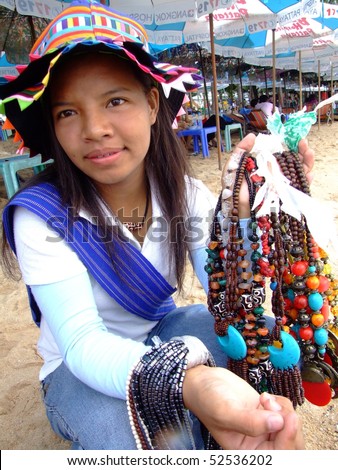 stock photo : PATTAYA, THAILAND - AUGUST 8: Thai woman sells variety of hill