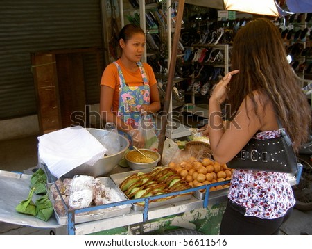 JUNE 2: Thai woman sells