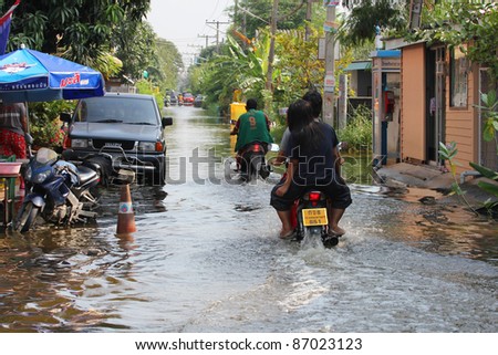 PRATHUMTHANI, THAILAND - OCTOBER 19: Heavy flooding from monsoon rain in Ayutthaya and north Thailand arriving in Bangkok suburbs on October 19, 2011 in Prathumthani, Thailand.
