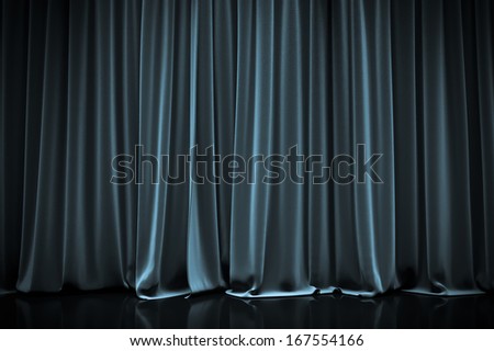 blue closed curtain in a theater