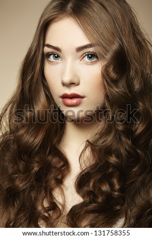 Portrait Young Beautiful Woman With Curly Hair. Fashion Photo