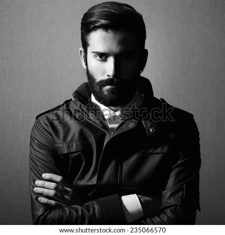 Portrait of handsome man with beard Fashion photo Black and white photo Portrait of handsome man with beard Fashion photo Black and white photo