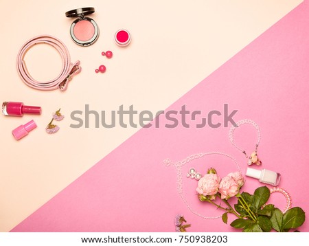 Fashionable Women\'s Cosmetics and Accessories. Flat Lay. Nail Polish and blush. Jewelry and Rings. A bouquet of flowers. Pink roses