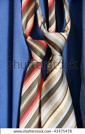 two necktie on blue background shirt