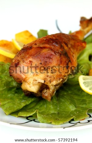 Turkey leg with potatoes and salad