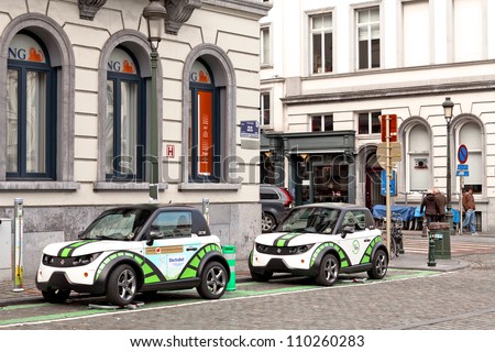 BRUSSELS - MARCH 14: Zen Car Europe\'s first electric car to rent on the square opposite the Luxembourg European Parliament March 14, 2012 in Brussels, Belgium