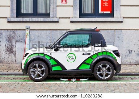 BRUSSELS - MARCH 14: Zen Car Europe's first electric car to rent on the square opposite the Luxembourg European Parliament March 14, 2012 in Brussels, Belgium