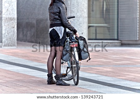 Cyclist on a city street. Urban scene.
