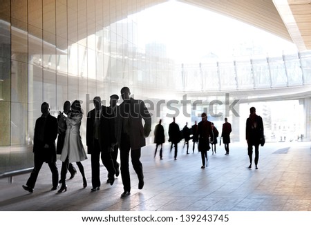 A Large Group Of People In The Office Center. Panorama. Urban Scene.
