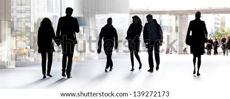 A large group of people on a light background. Panorama. Urban scene.