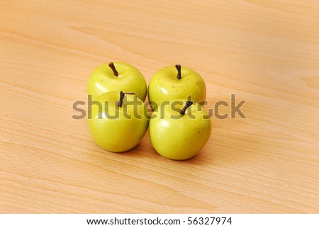 Four green apples