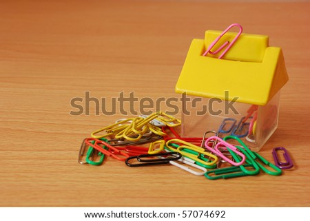 Paper clips with a container