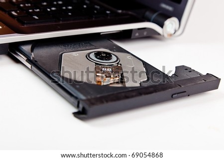 close up of a laptop with opened dvd tray