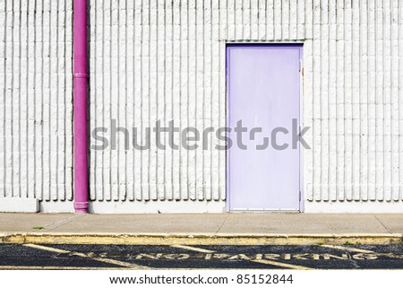 wall background with purple door, pink gutter & no parking