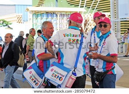 MILAN, ITALY - MAY 28, 2015: Expo 2015 \'feeding the planet, energy for life\' is attracting millions of people from the whole world till october 31. Volunteers