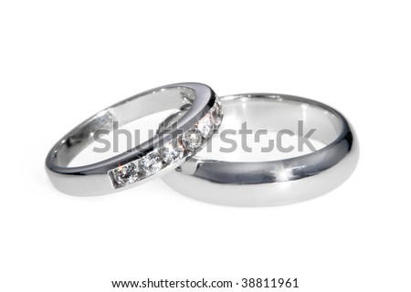 stock photo Diamond and white gold bride and groom wedding bands rings 