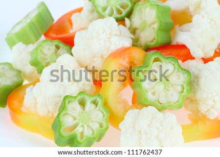 Vegetable salad greens made from okra, cauliflower, red pepper lettuce