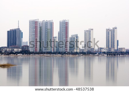 New city of Modern China reflected in the waterModern