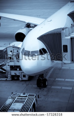 Airplane Loading At The Airport And Loading Cargo