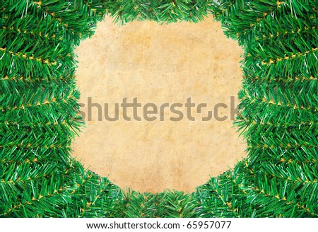 Christmas green framework with Pine needles  isolated on paper textures background