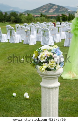 stock photo Beautiful wedding flower arrangement of seats along the aisle