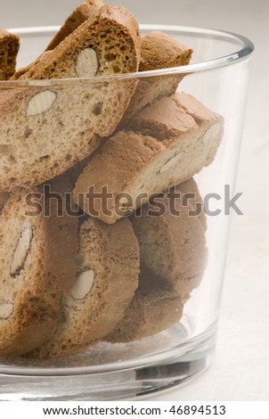 Spanish cuisine. Almond cookies in a glass. Selective focus. Carquinyolis.