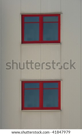 Inclusion of a row of houses with two windows with red frame