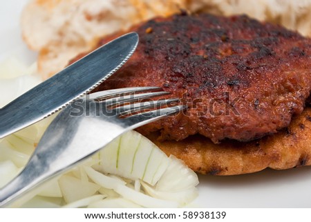 hamburger steak in flatbread (lepinja) with onion