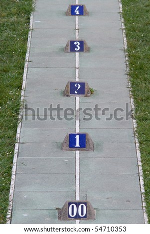 distance markers on the ground, used for sporting events
