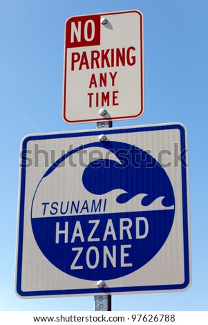 A road sign warning that the area is a Tsunami Hazard Zone.