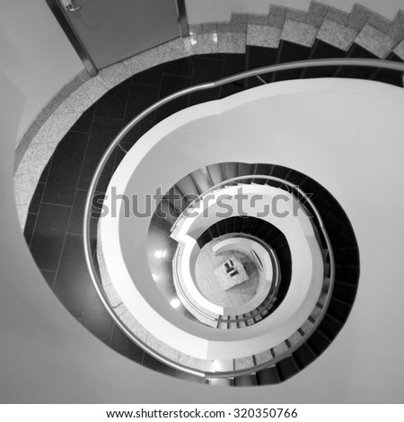 Black and white abstract spiral staircase