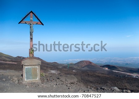 Cross near the road to peak of mt. Etna, Lipari, Sicily, Italy