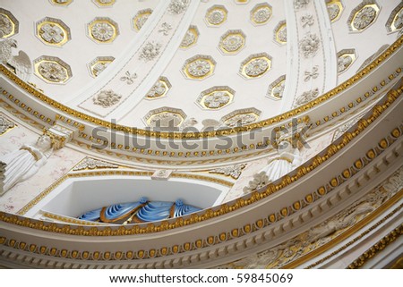 Vintage roof interior with gold covered sculptures