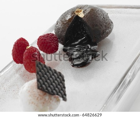 stock photo : Assorted desserts on glass tray