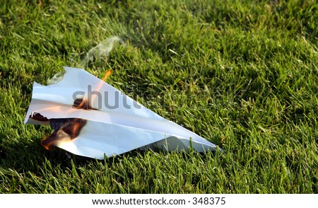 the lost plane  Stock-photo-a-crashed-paper-airplane-that-caught-fire-on-blurred-grass-background-348375