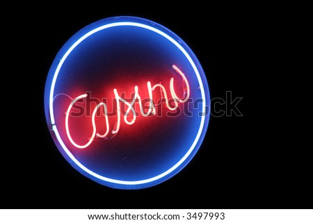 A circular neon sign at a casino