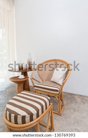 Beautiful bamboo rattan furniture in a summer setting