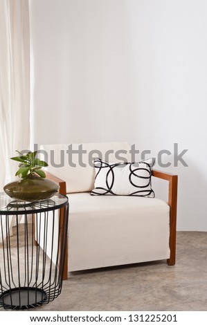 Bright white armchair in a living room