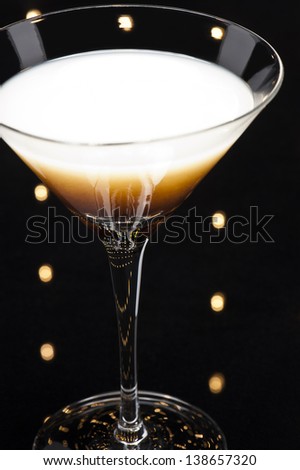 Coffee Martini cocktail in front of disco lights