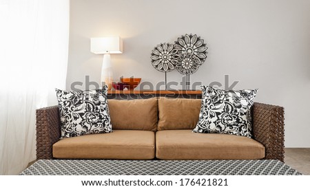 Beige brown sofa in luxurious interior setting