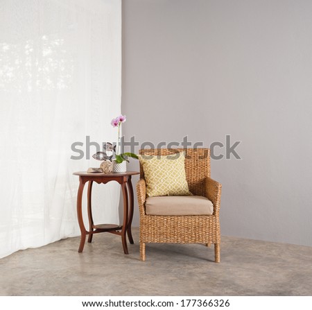 Rattan Sofa Chair In A Patio Garden Lounge Setting