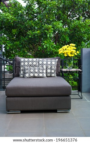 Outdoor patio seating with nice grey daybed