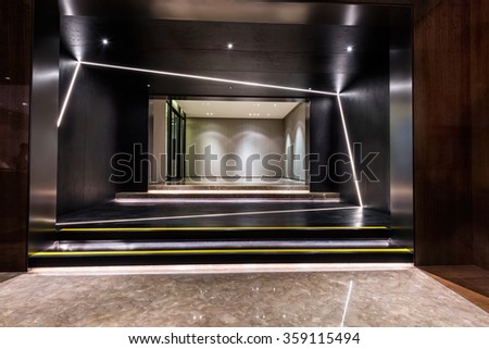 Illuminated and empty foyer entrance area of a building