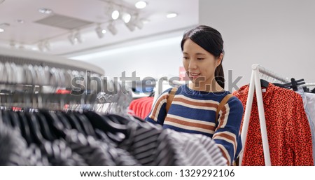 Woman shop in boutique