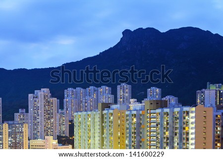 Hong Kong cityscape with lion rock at night