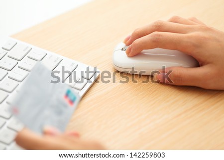 Online shopping with credit card and keyboard