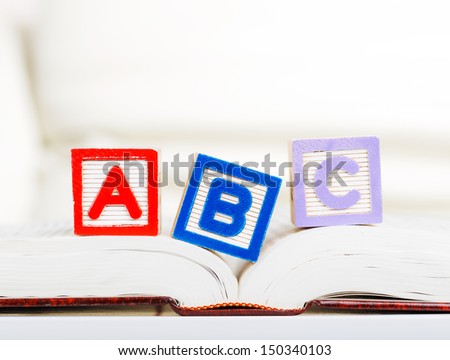 Alphabet block with ABC on book