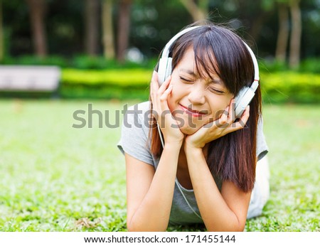 Asian young girl enjoy listen to music