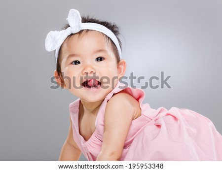 Little girl with tongue sticking out